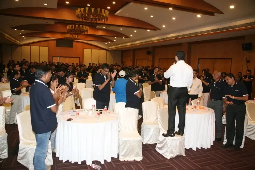 One of the top motivational speakers in Hyderabad receives a standing ovation from the Dr. Reddy's Labs global finance team during a high-energy corporate event
